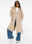 Trench coat Lapel collar, button fastening at front, twin hip pockets, removable waist tie, adjustable buckle cuff, split at back