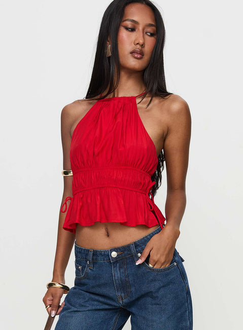 side view of model wearing Princess Polly Rozier Top Red Sleeveless High Neck 