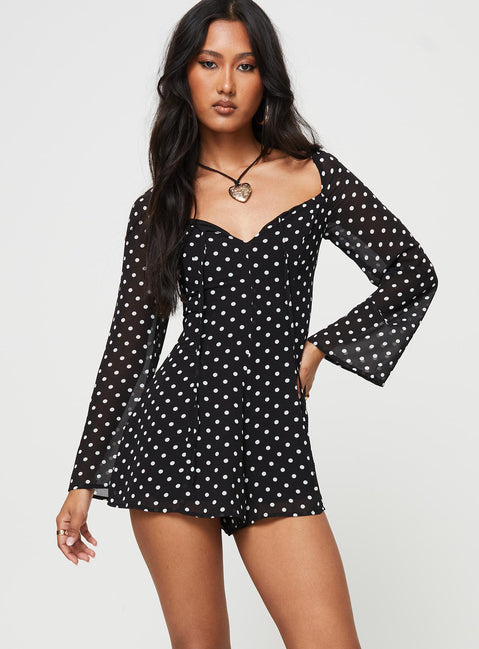 Polka dot romper Square neckline, tie fastening at bust, invisible zip fastening at back Non-stretch material, fully lined