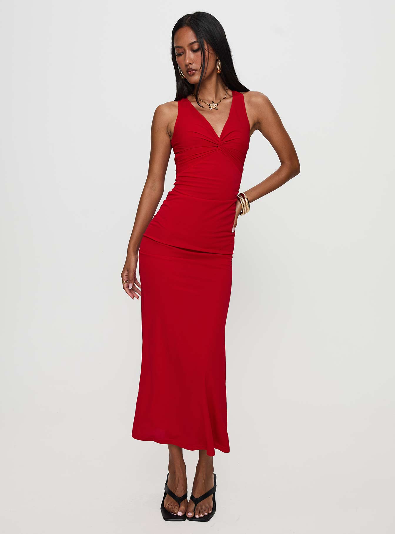 side view of model wearing Princess Polly Mesmerise Halter Maxi Dress Red V-Neck 