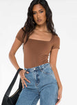 front view of model wearing Princess Polly Byer Bodysuit Brown Short Sleeves Square Neck 