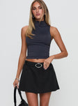   front view of model wearing Princess Polly Barrymore Mini Skort Black Mini Skirts 