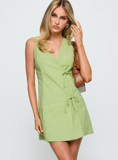 front view of model wearing Princess Polly Kodee Mini Dress Sage V-Neck 