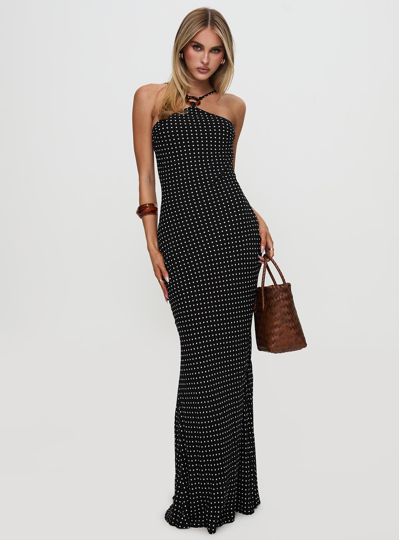 front view of model wearing Princess Polly Evyn Halter Maxi Dress Polka Dot Asymmetric Neckline 
