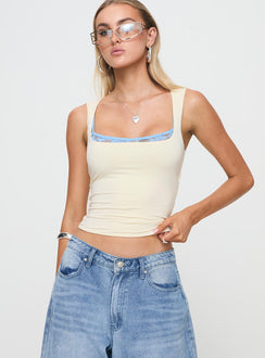 front view of model wearing Princess Polly Back In Time Top Cream/Blue Sleeveless Scoop Neck 