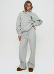 front view of model wearing Princess Polly Princess Polly Wide Leg Track Pant Bubble Text Grey Marle / Green 