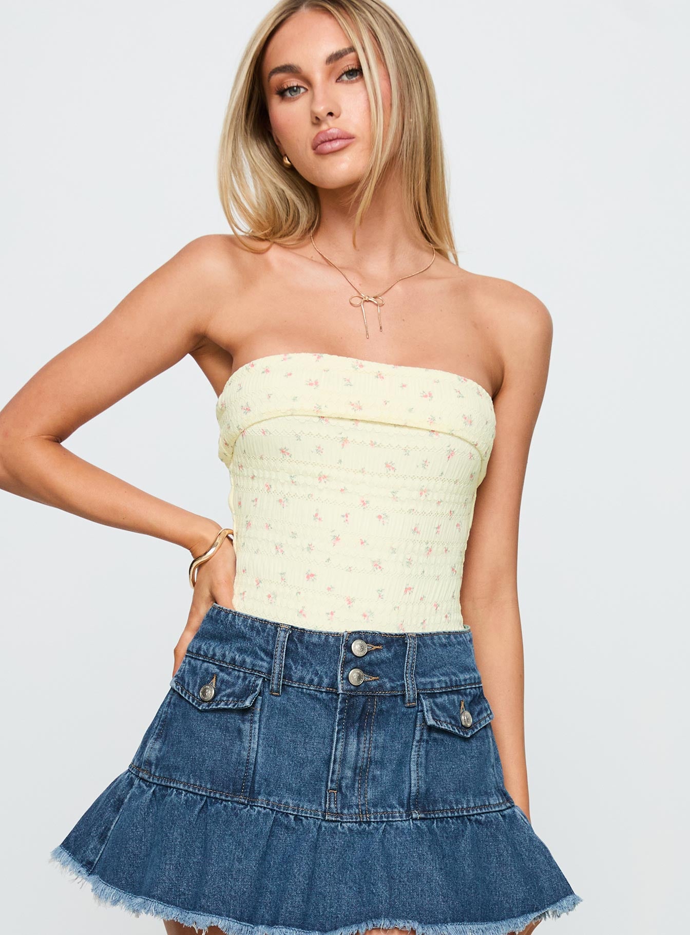 side view of model wearing Princess Polly Majorette Strapless Bodysuit Cream Sleeveless 