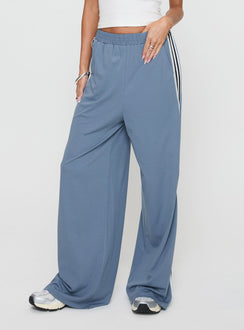 back view of model wearing Princess Polly Dime Track Pants Blue High Waisted Pants 