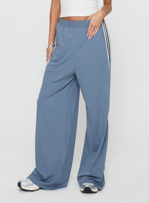 back view of model wearing Princess Polly Dime Track Pants Blue High Waisted Pants 