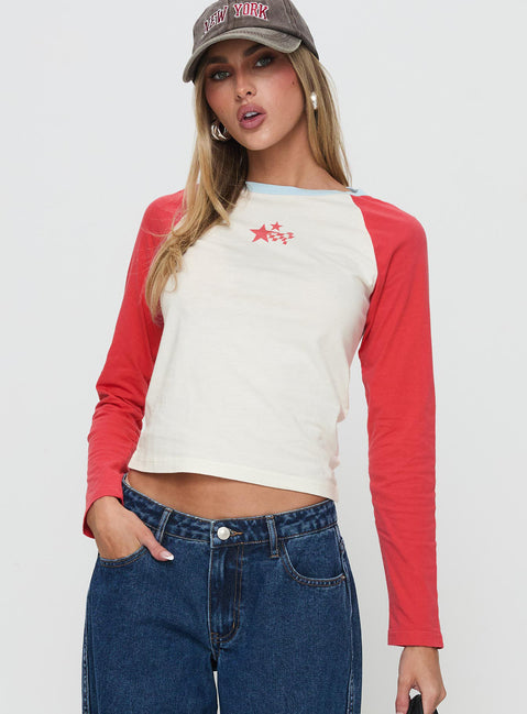 front view of model wearing Princess Polly Racing Star Long Sleeve Top Red Full Sleeves Crew Neck 