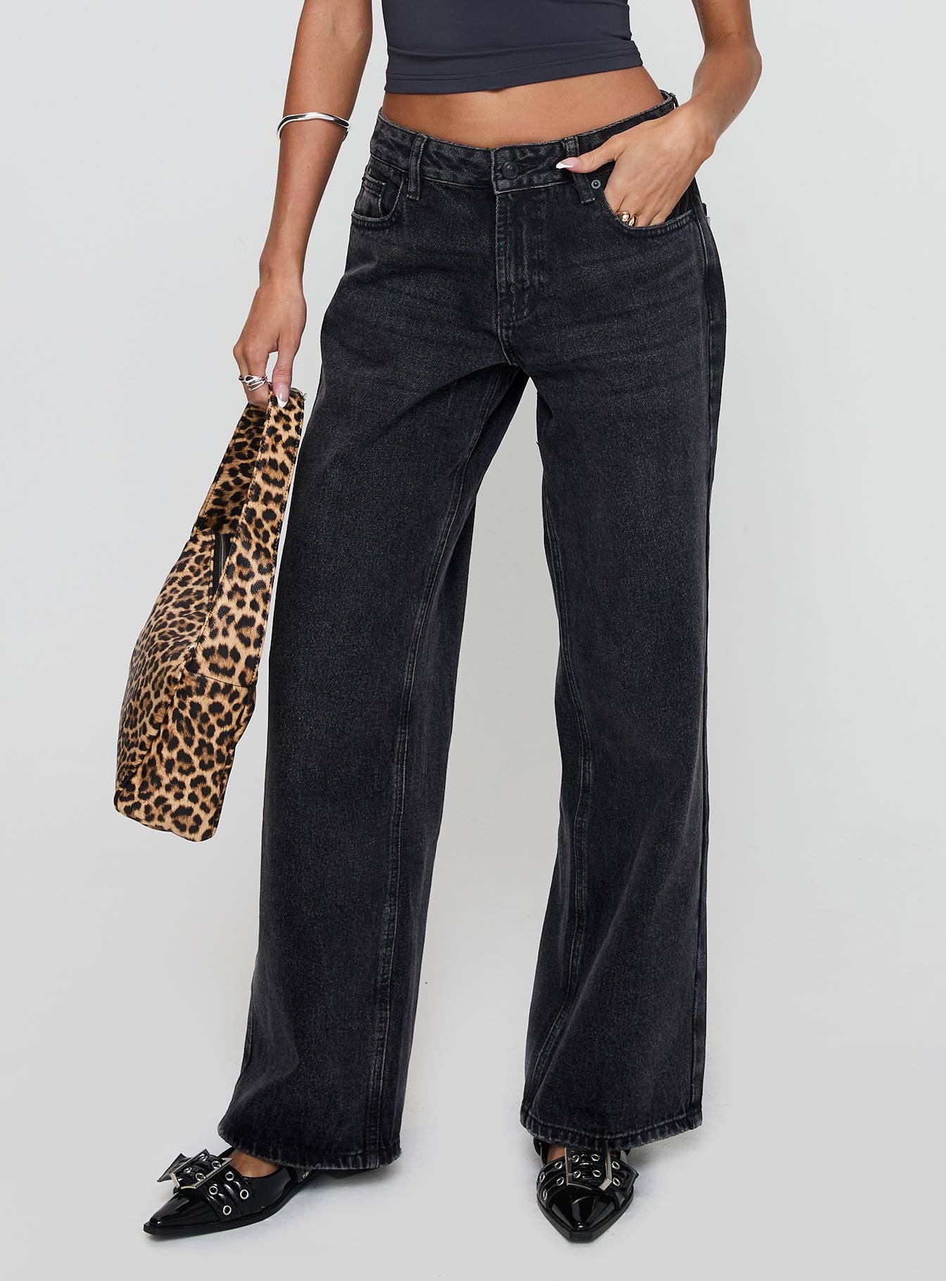 front view of model wearing Princess Polly Serenitia Mid Rise Relaxed Jeans Washed Black Tall Mid Rise 