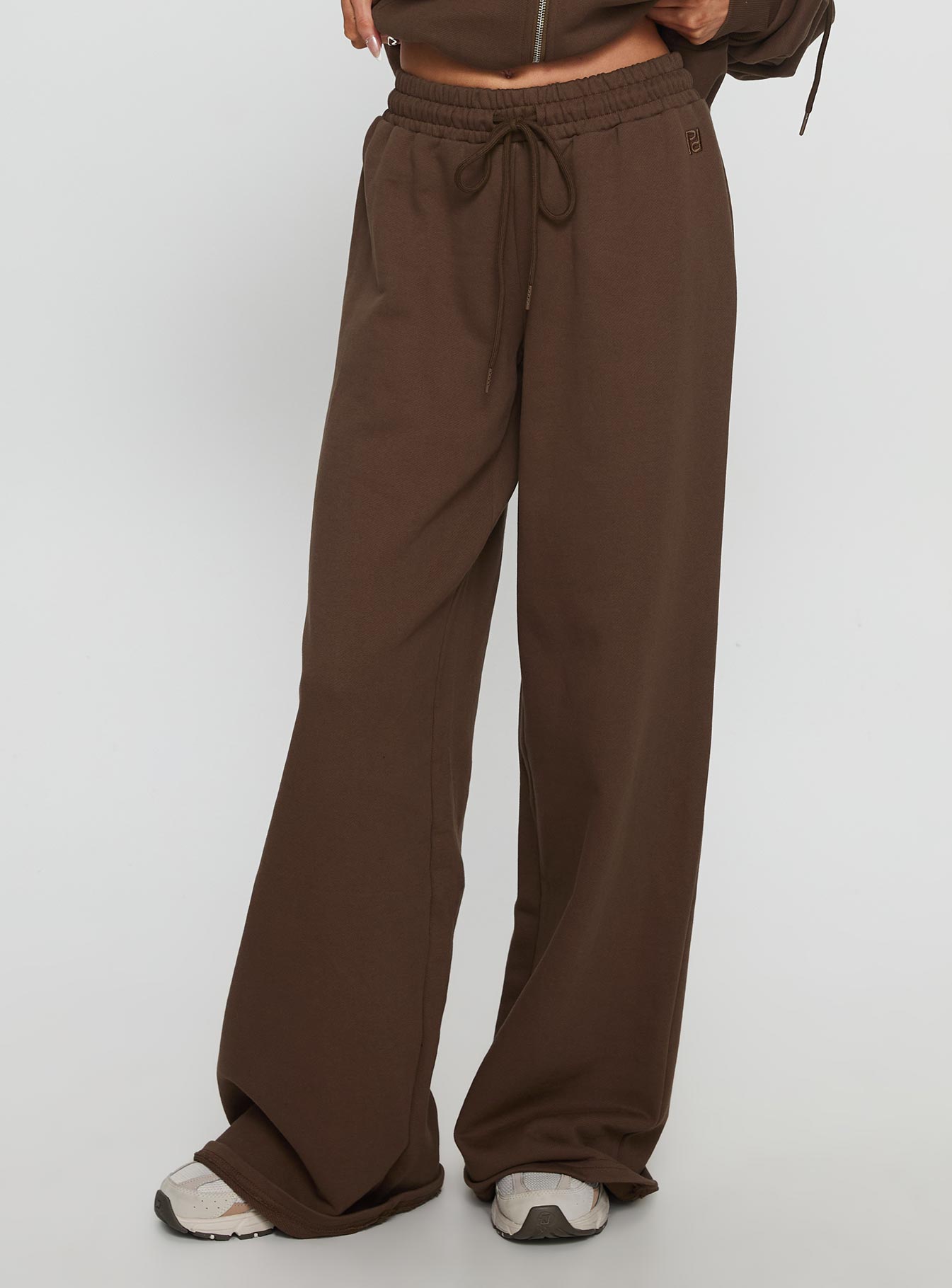 front view of model wearing Princess Polly All Day Straight Leg Sweatpants Chocolate Brown High Rise Pants 