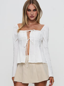 front view of model wearing Princess Polly Lilibette Tie Up Long Sleeve Top White Full Sleeves Square Neck 