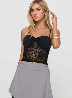 side view of model wearing Princess Polly Halls Lace Top Black Sleeveless Sweetheart 