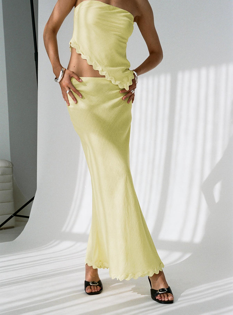 back view of model wearing Princess Polly Silvershore Maxi Skirt Yellow Maxi 