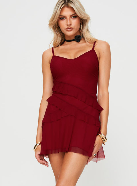 side view of model wearing Princess Polly Meliodas Ruffle Mini Dress Red V-Neck 