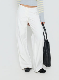 back view of model wearing Princess Polly Hereos Mid Rise Baggy Leg Jeans White Mid Rise Jeans Jeans 