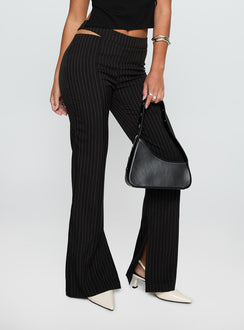 side view of model wearing Princess Polly Amaretti Pants Black High Waisted Pants 