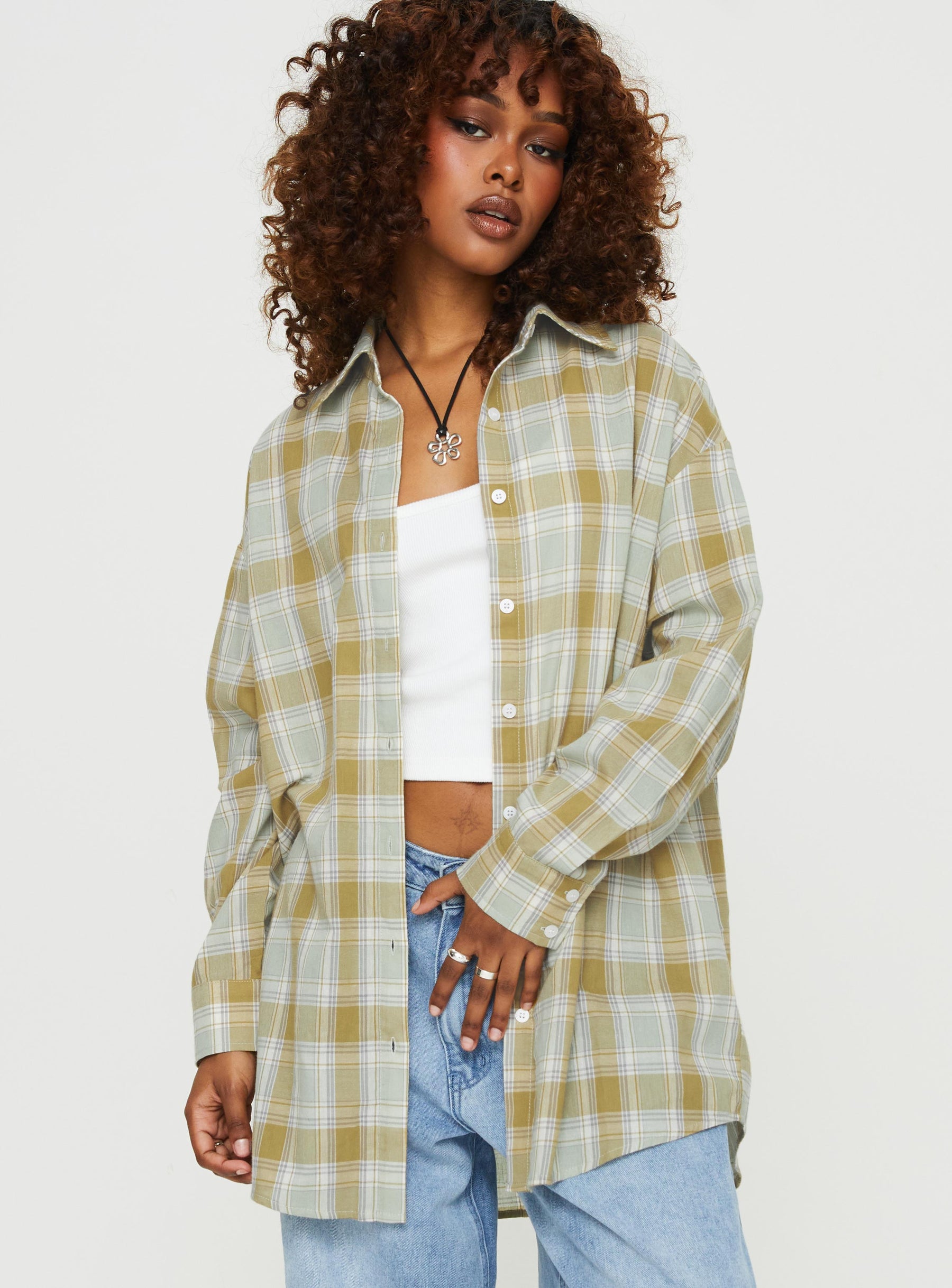 Front view of model wearing  front Princess Polly Full Sleeves Square Neck  Tollen Top Green Check