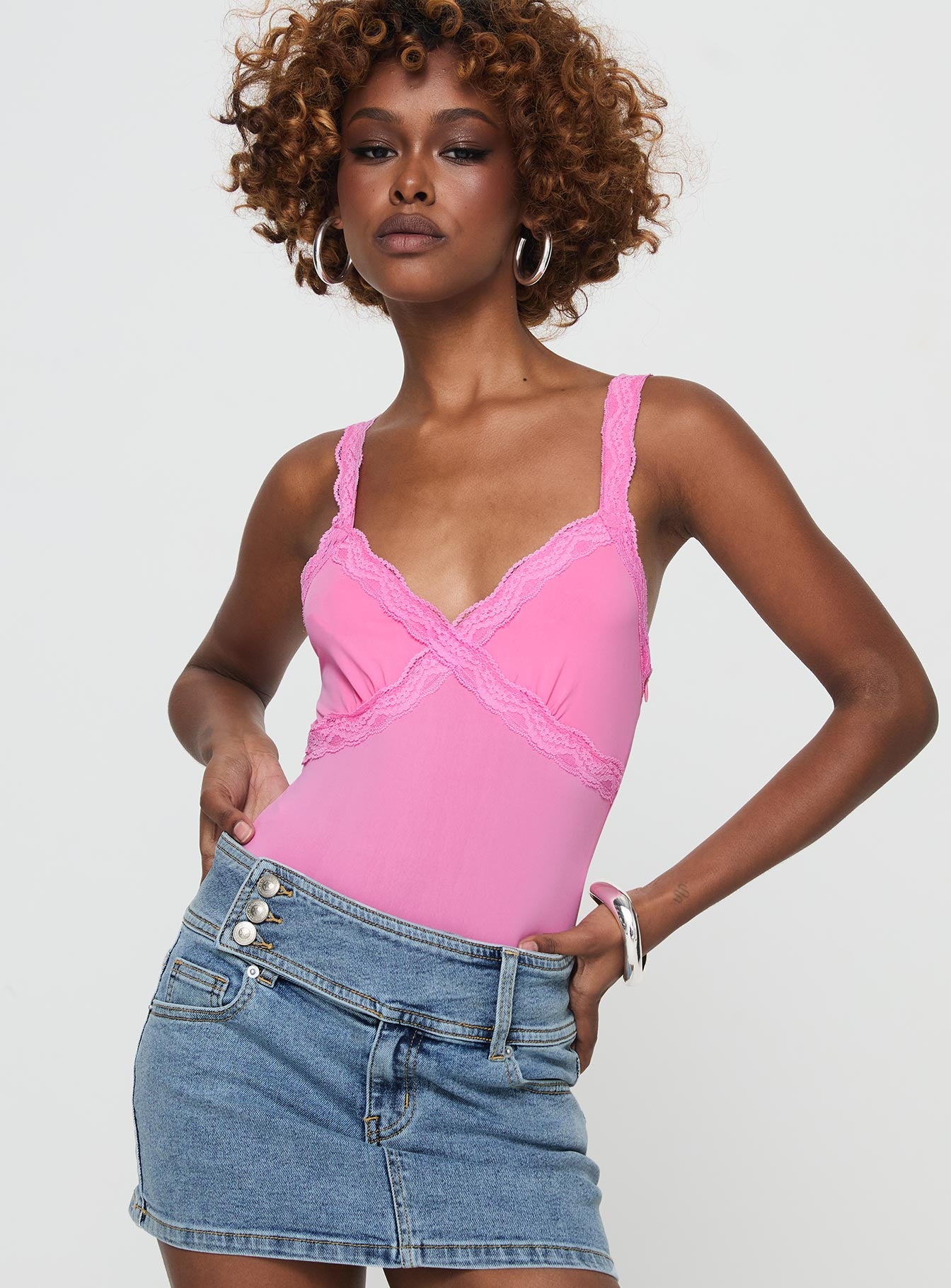 front view of model wearing Princess Polly Girlz Bodysuit Pink Sleeveless V-Neck 