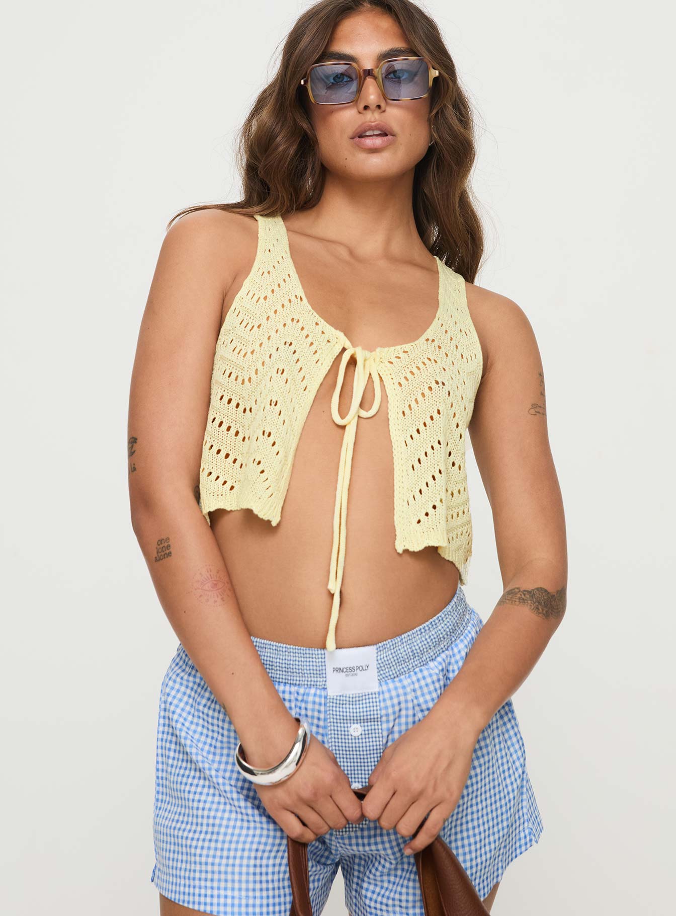 side view of model wearing Princess Polly Walnut Top Cream Sleeveless Scoop Neck 