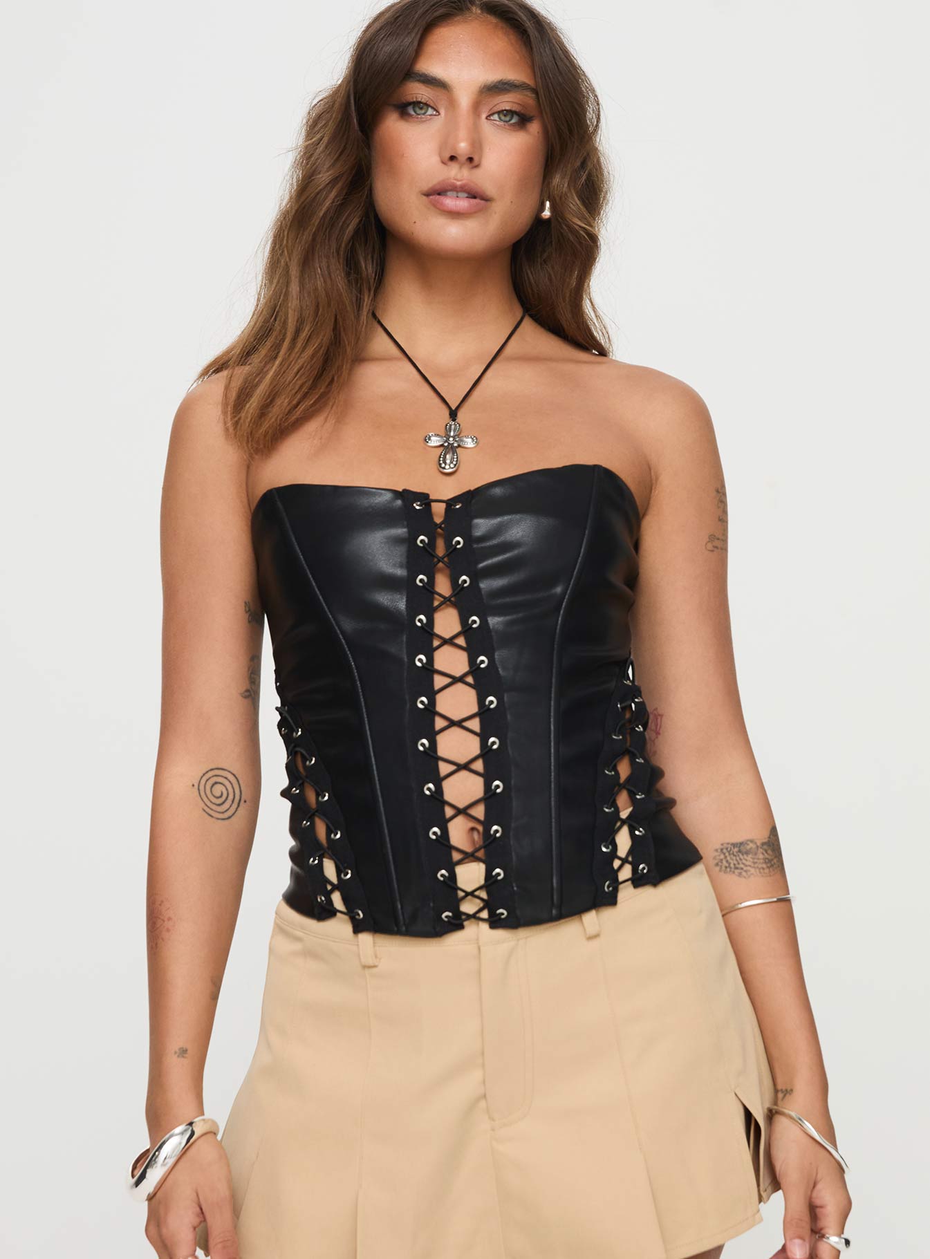 front view of model wearing Princess Polly Emberlyn Faux Leather Corset Top Black Sleeveless straight 