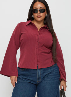 front view of model wearing Princess Polly Anni Pinstripe Shirt Red Curve Full Sleeves V-Neck 