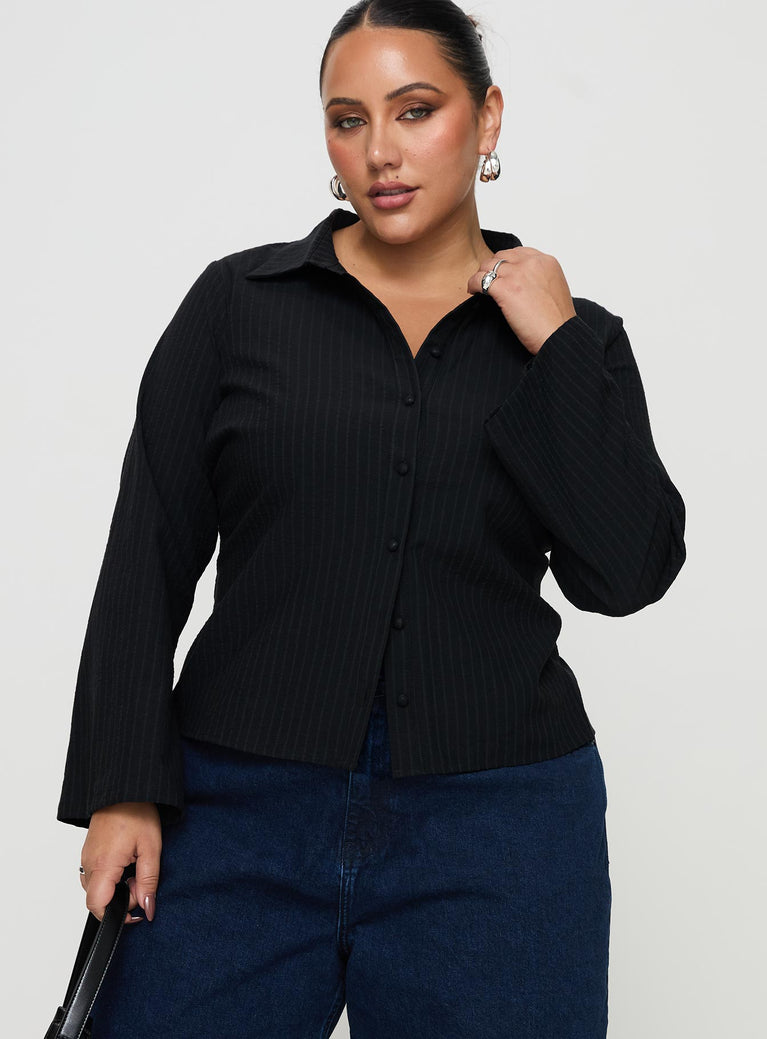 front view of model wearing Princess Polly Anni Pinstripe Shirt Black Curve Full Sleeves High Neck 