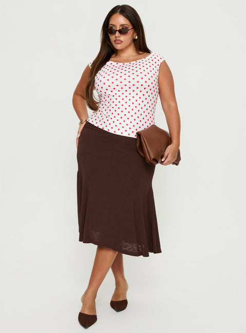   side view of model wearing Princess Polly Lewish Low Rise Midi Skirt Chocolate Curve Midi Skirts 