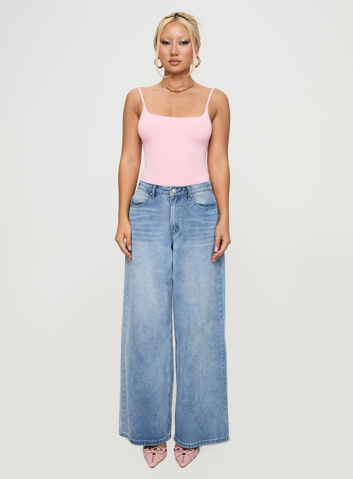 side view of model wearing Princess Polly Sweet Life Bodysuit Pink Sleeveless 