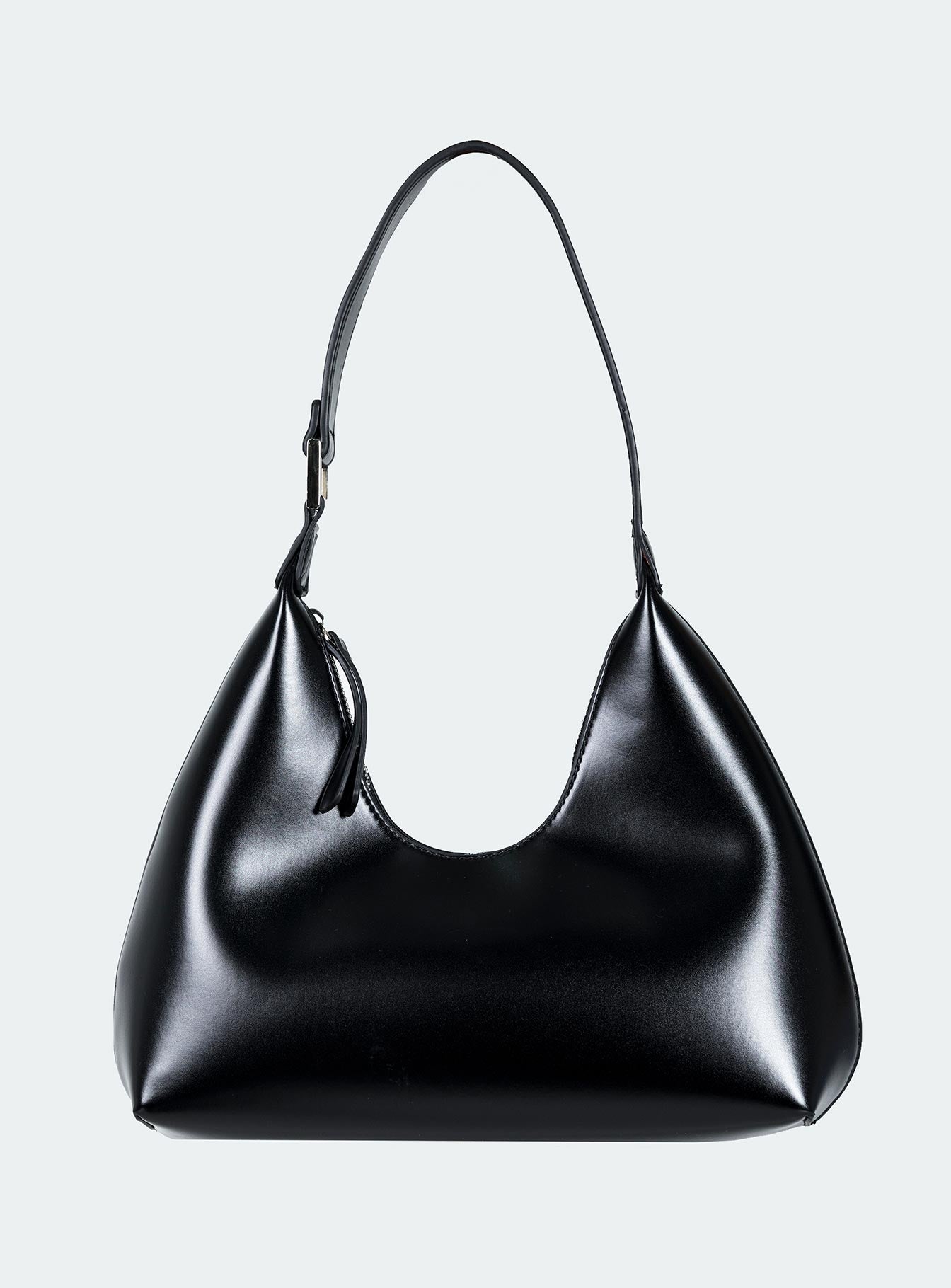 Shoulder bag Faux leather material Fixed shoulder strap Zip fastening Silver-toned hardware Internal card slip