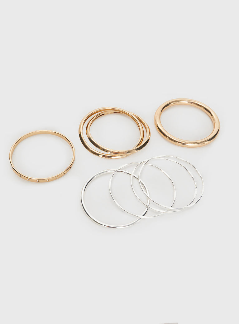 Bracelet pack Pack of eight, four gold-tone bangle style, four silver-toned bangle style, fixed size