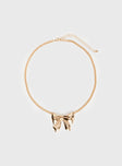 Gold-toned necklace Bow charm, lobster clasp fastening