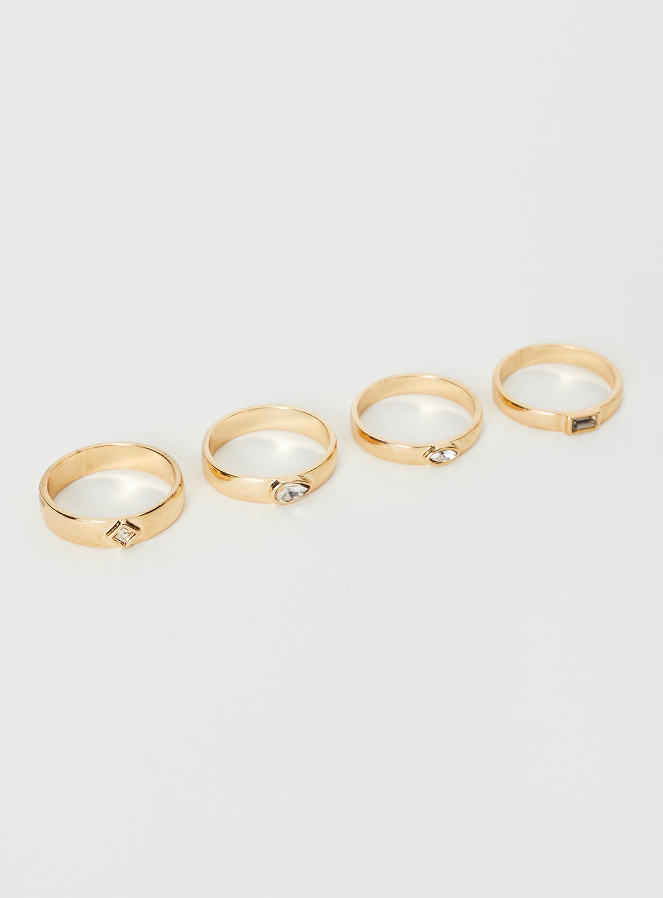 Ring pack Gold toned, four pack, gem detail
