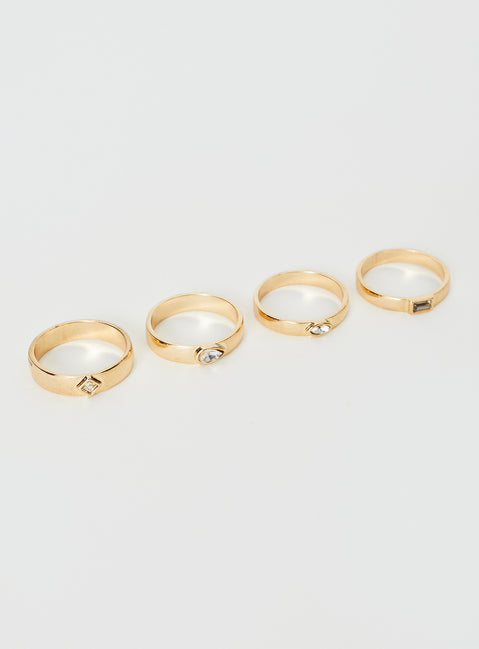 Ring pack Gold toned, four pack, gem detail