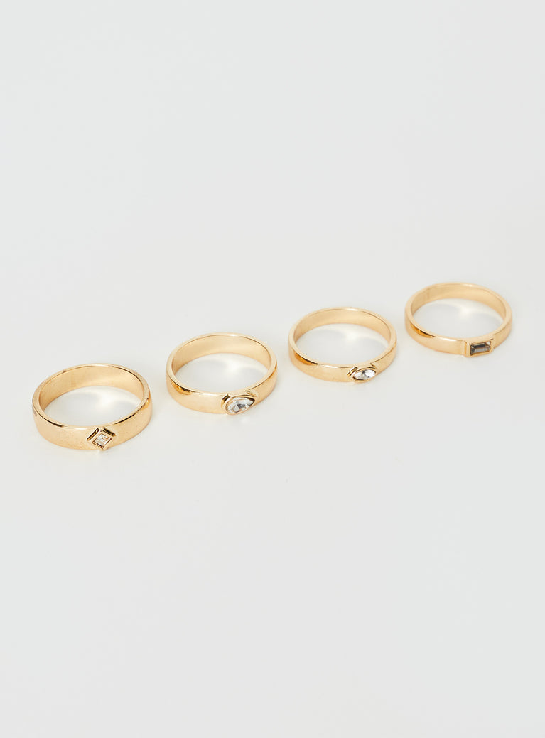 Ring pack Gold toned, four pack, gem detail