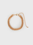 Gold-toned bracelet Chunky design, lobster clasp fastening