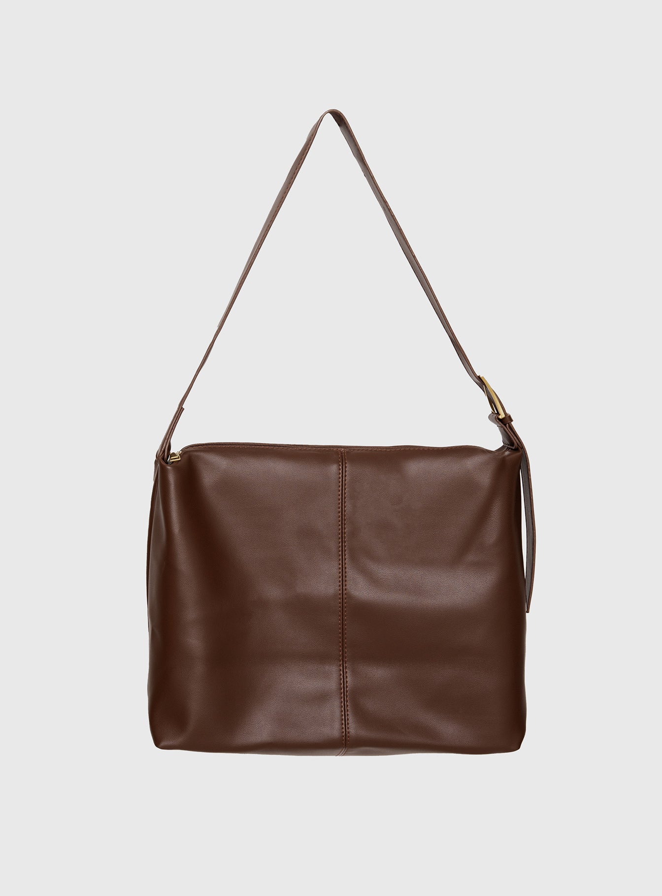 Faux leather bag  Adjustable shoulder strap, gold-toned buckle, single internal pocket with zip fastening, fully lined