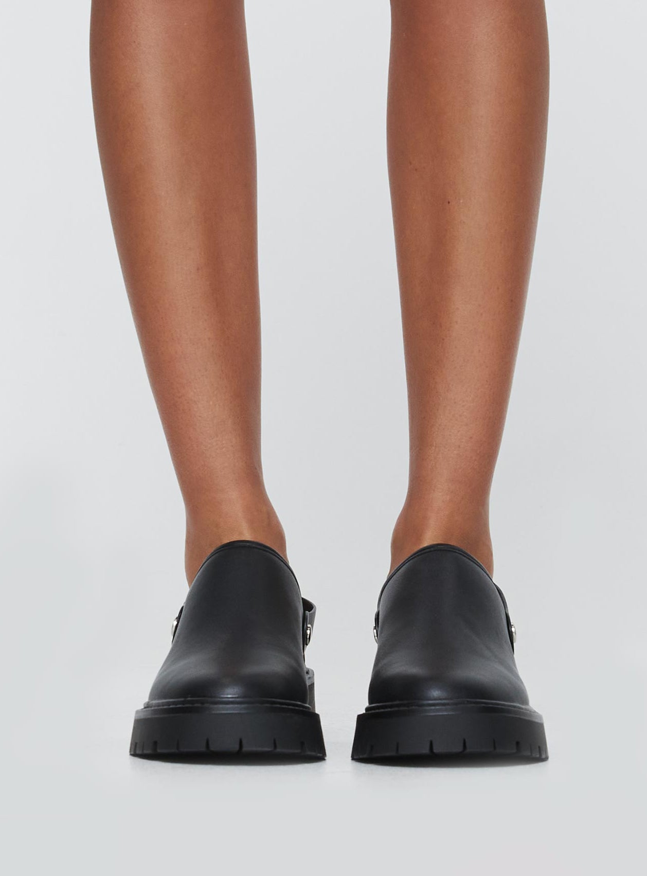 Faux leather mule Platform base, block heel, slip on design, sling back strap