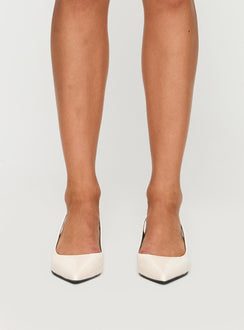 Kitten heel Patent material look, pointed toe, sling back style, pin buckle fastening