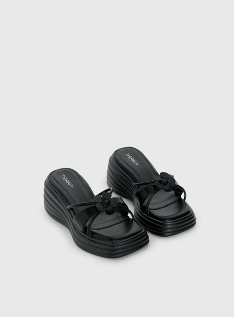 Therapy Flaunt Plateau-Sandalen mit Blumen-Detail Schwarz
