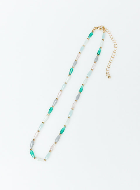 Necklace Gold toned hardware Lobster clasp fastening