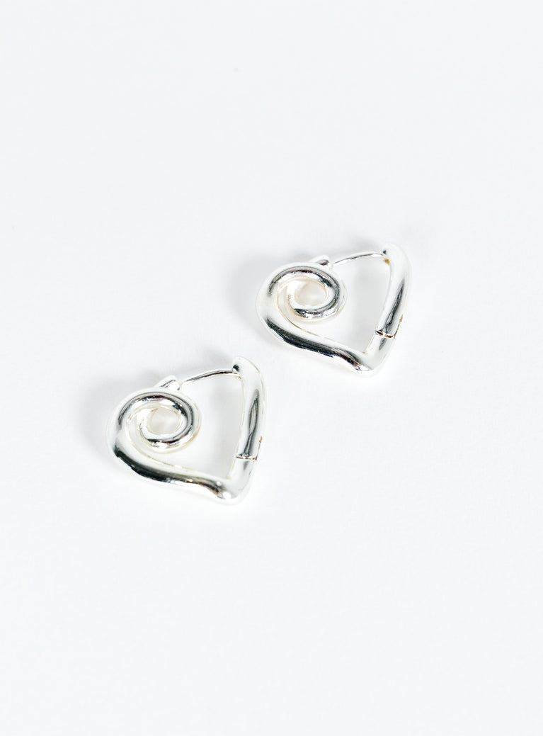 Silver toned earrings Hinged hoop fastening