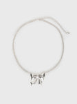 Silver-toned necklace Bow charm, lobster clasp fastening