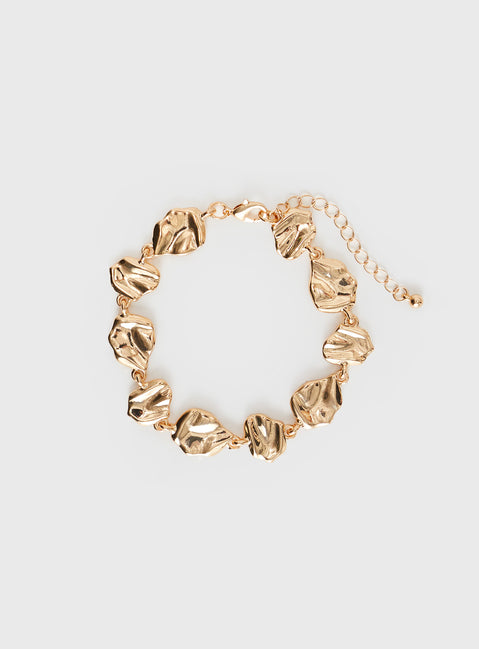 Gold-toned bracelet Heavy weight, lobster clasp fastening
