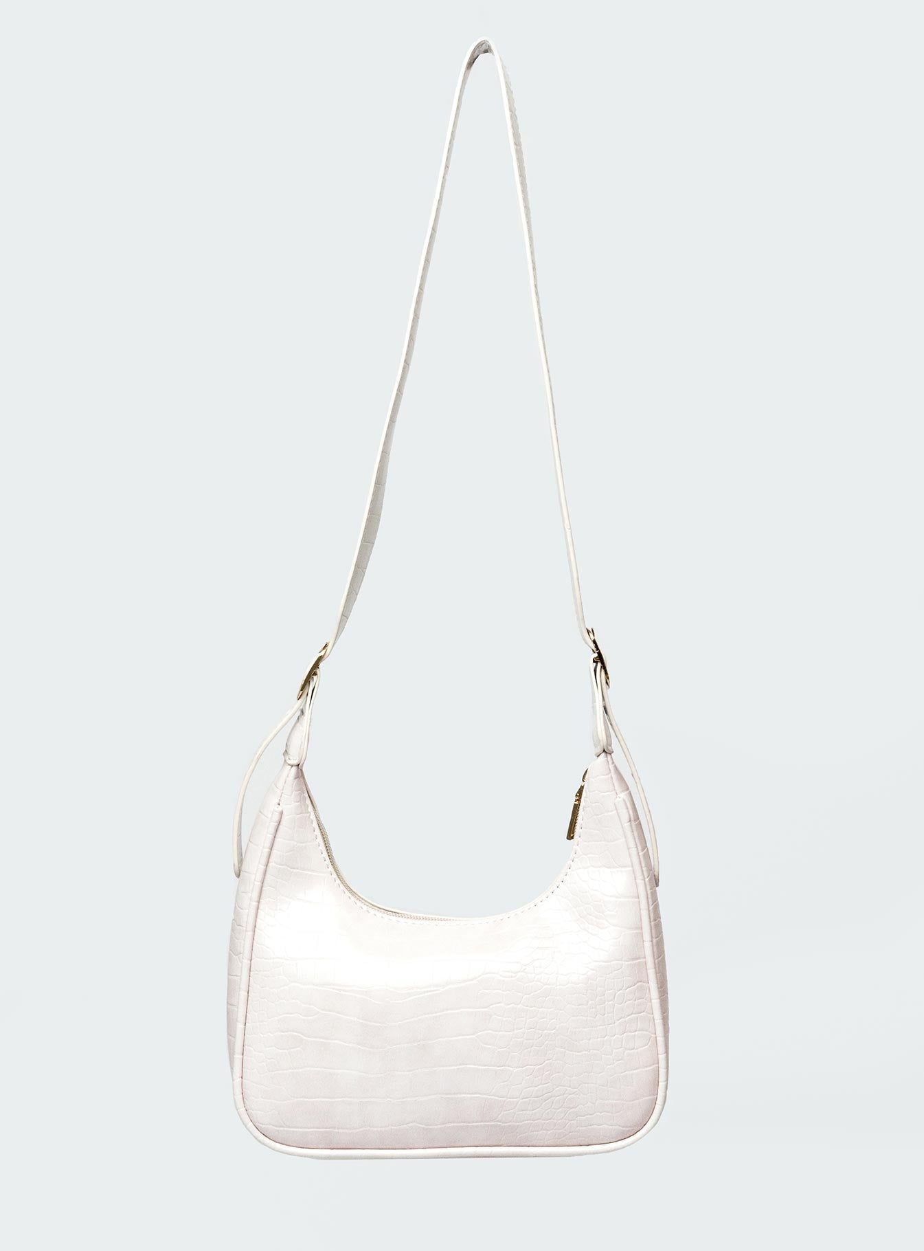 Shoulder bag Adjustable shoulder strap  Gold-toned hardware   Zip fastening  Single internal zip pocket  Flat base 