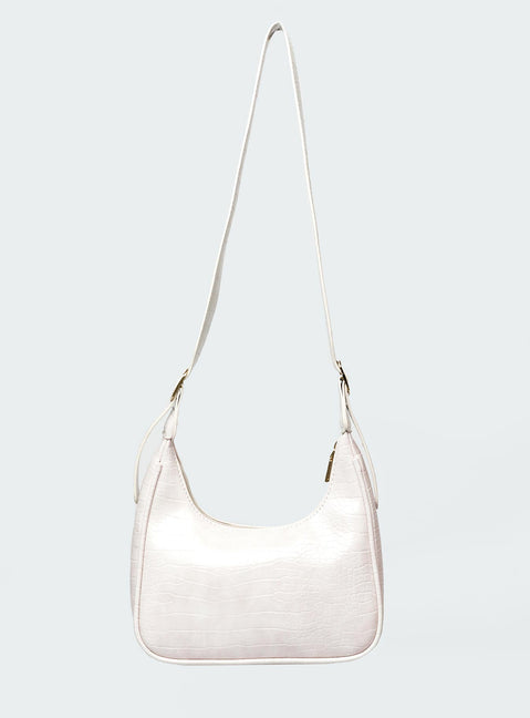 Shoulder bag Adjustable shoulder strap  Gold-toned hardware   Zip fastening  Single internal zip pocket  Flat base 