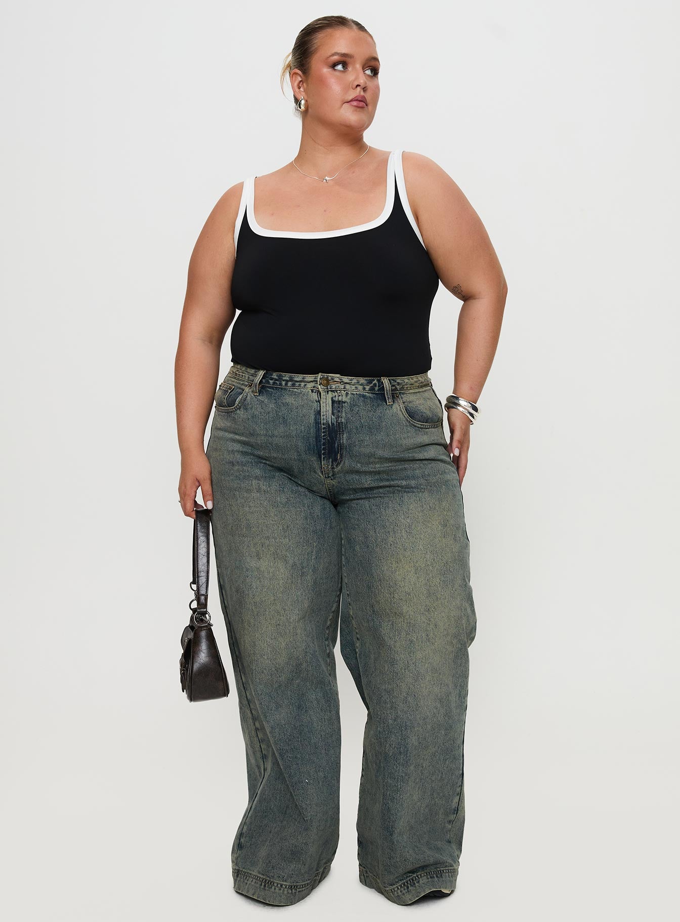 front view of model wearing Princess Polly Astrea Bodysuit Black / White Curve Sleeveless 