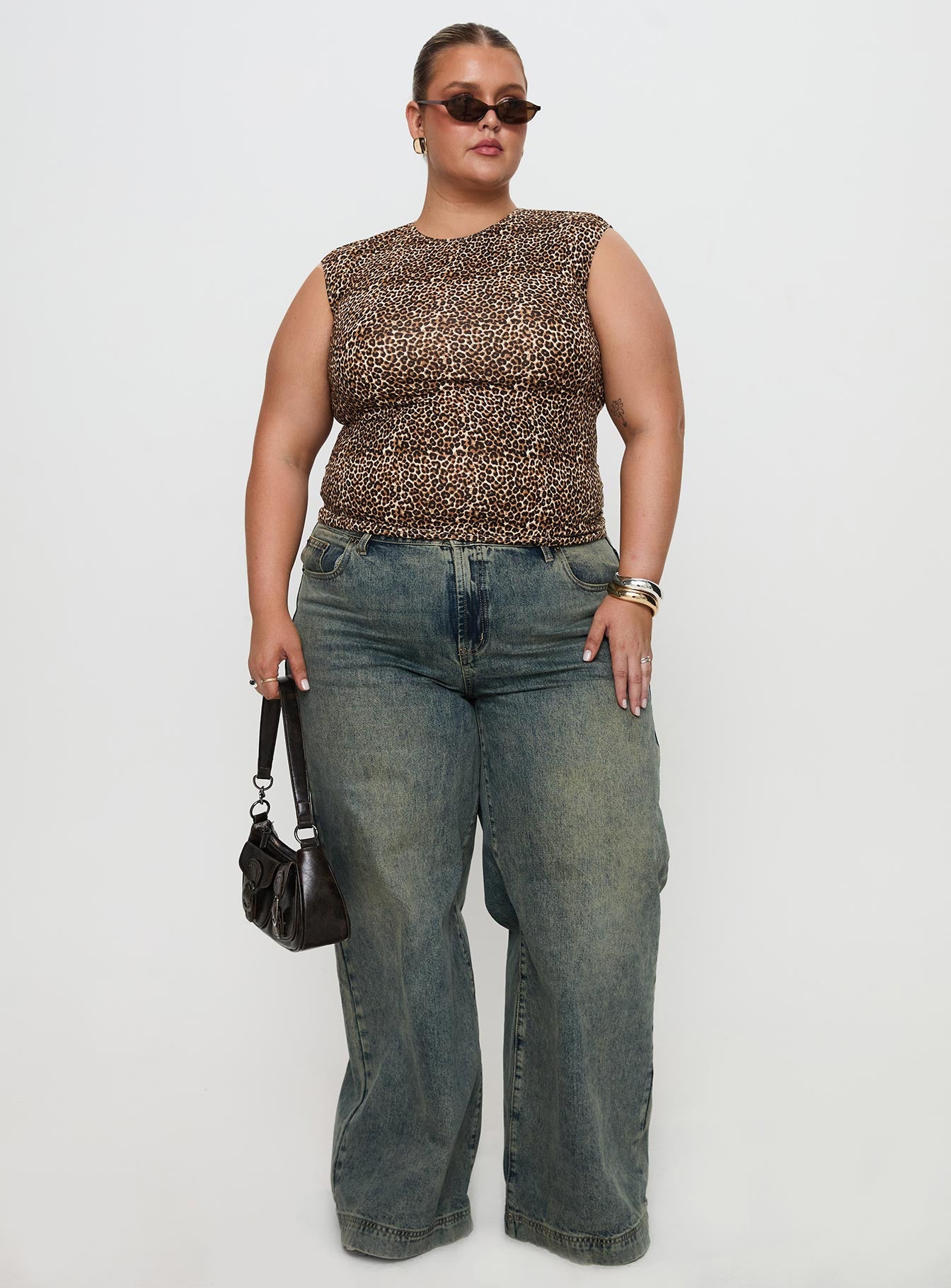 back view of model wearing Princess Polly Lure Top Leopard Curve Sleeveless Crew Neck 