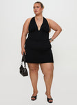 front view of model wearing Princess Polly Tinisie Halter Mini Dress Black Curve Plunger 